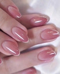 24 Pcs Round-shaped pink ombre press-on nails with delicate gold glitter tips