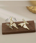 Asymmetrical butterfly earrings