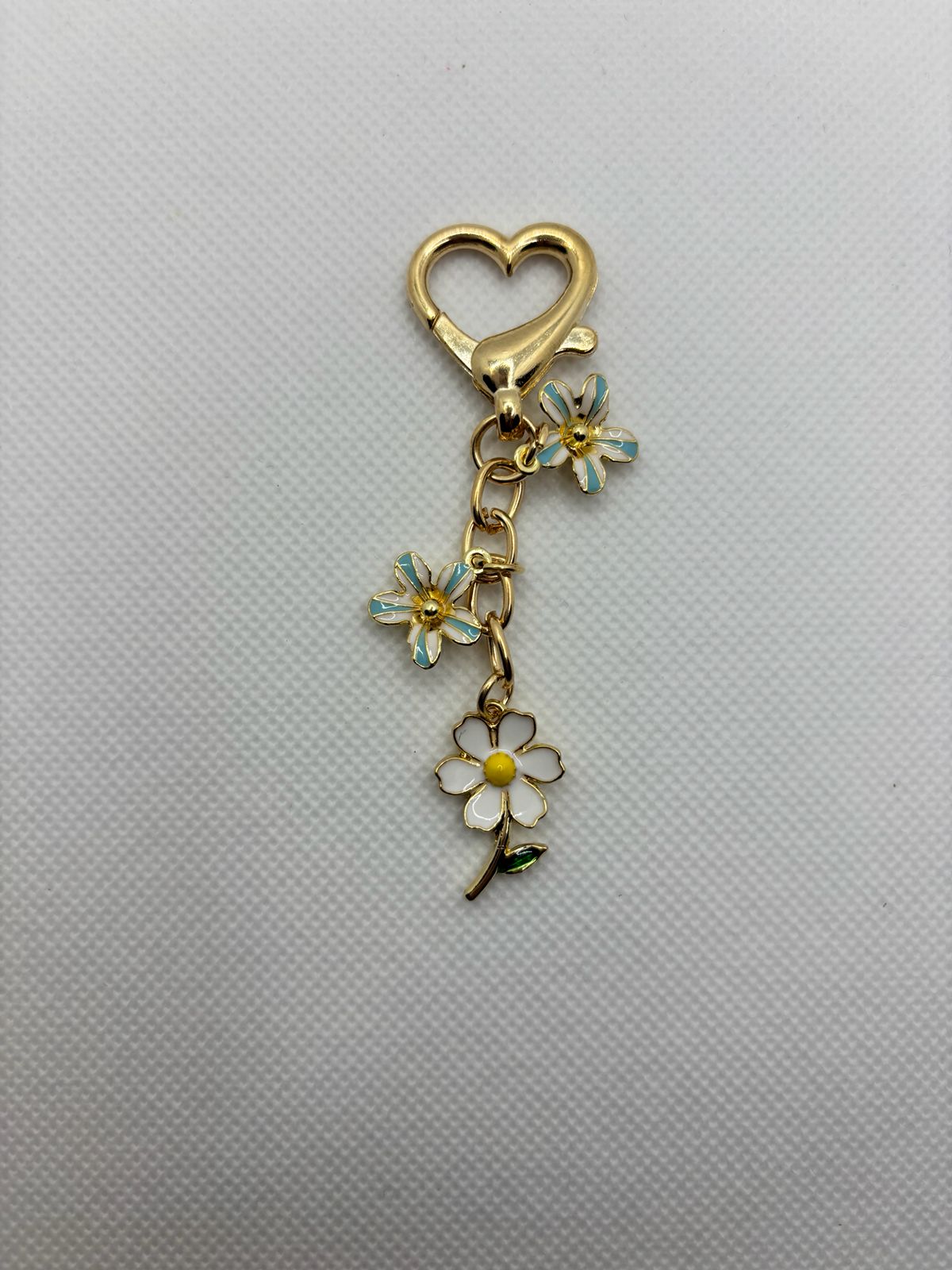 Blue and white flowers with white big flower charm