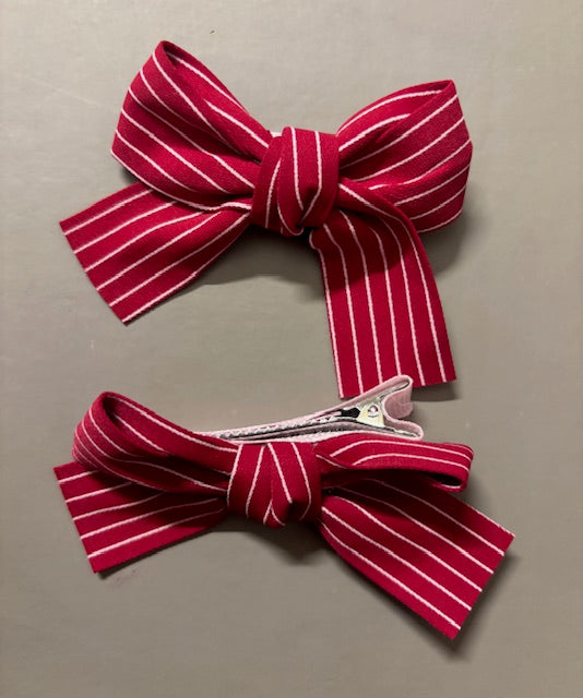 Red with white lines Bows