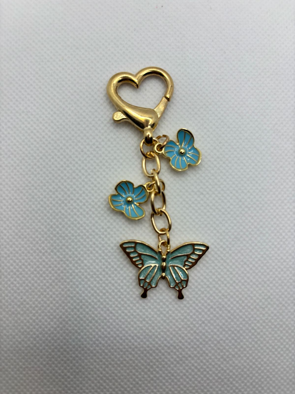 Turquoise Butterfly and Flower Charm